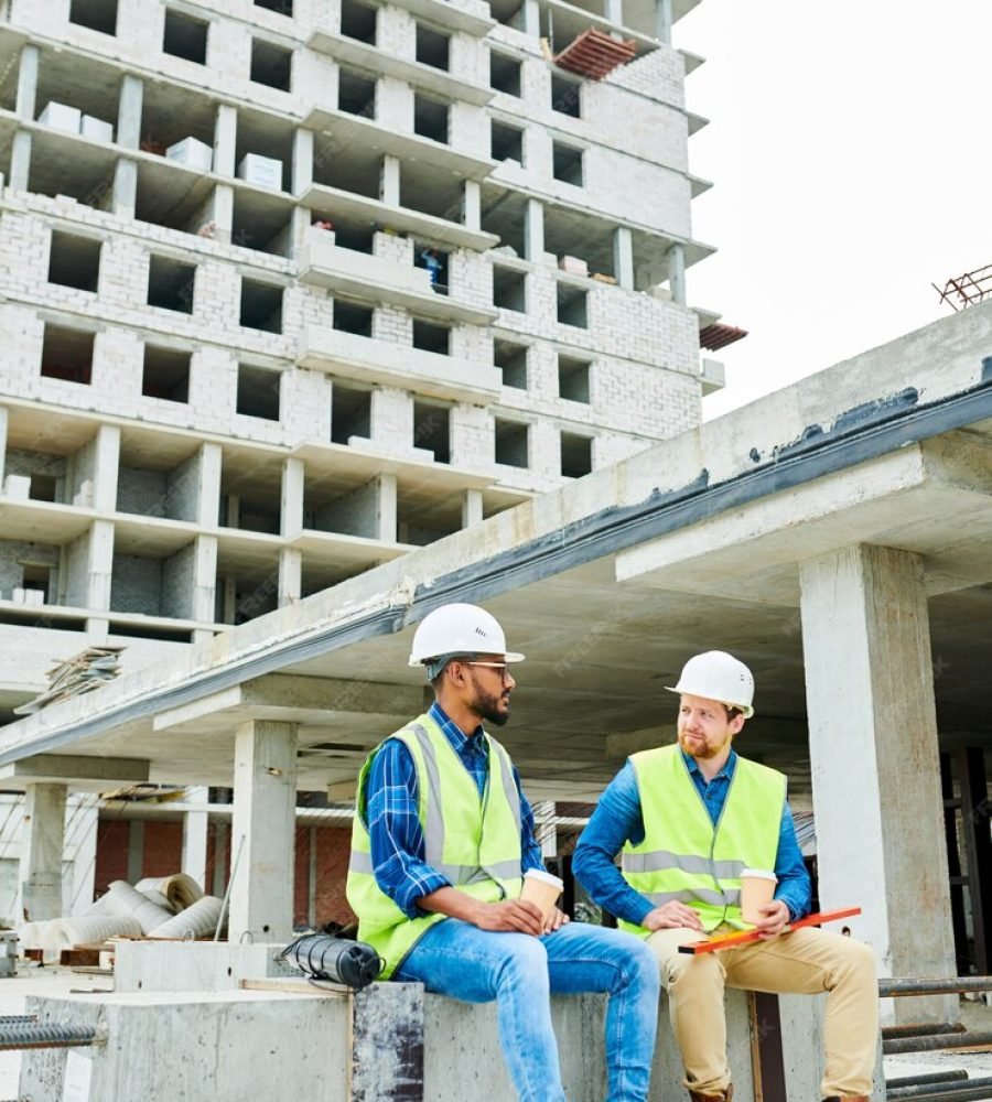 multiethnic-engineers-having-break-construction-site_236854-10064